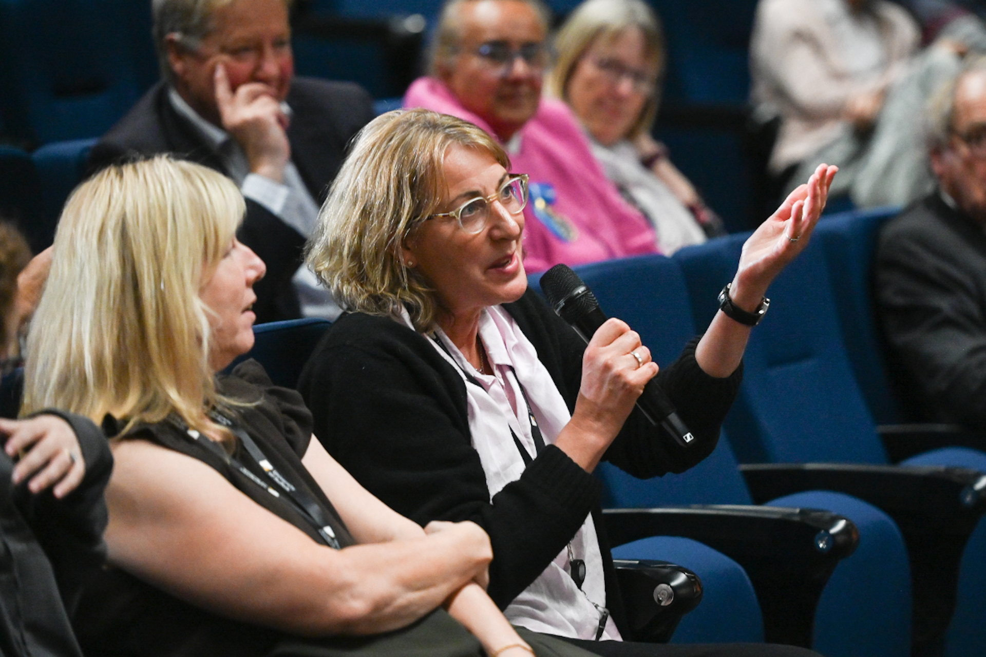 An audience member asking a question at a University of Suffolk Spotlight Suffolk event.